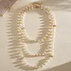 Collar de perlas en capas con cuentas transfronterizo europeo y americano, cadena para la clavícula estilo fiesta vintage, lujo ligero, accesorio versátil de alta gama para mujer