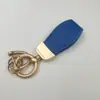 Colgante llavero de piel de oveja francesa Estilo Nuevo Cuero fresco creativo exquisito marca de moda llavero corto para coche