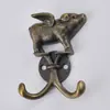 Gancho vintage con forma de jirafa, gancho de aleación de zinc de estilo europeo, gancho decorativo creativo para colgar en la pared o en la puerta, con borde cruzado.