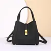 Bolso de mano de mujer más vendido transfronterizo, bolso de mano de lujo ligero, nuevo bolso tipo cubo de piel de vaca de capa superior para mujer, bolso tipo cesta de cuero genuino cruzado
