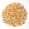 Venta al por mayor de fábrica Piedra triturada de cristal natural Cristal blanco Cuarzo rosa Piedra de cristal amarillo Materiales hechos a mano para decoración de uñas Piedra desmagnetizadora de cristal
