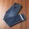 Primavera y Verano Europeo Delgado Transpirable Suave Cómodo Elástico Recto Holgado Casual de Negocios para Hombre Jeans de Algodón Tencel