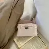 Bolso Pequeño de Alta Gama con Patrón de Cocodrilo para Mujer 2026 Nuevo Estilo Textura Simple Bolso Cuadrado de Mano Bolso Cruzado Elegante de Invierno