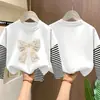Camiseta para niña, algodón puro, a rayas, manga larga, nuevo modelo primavera y otoño 2026, camiseta básica para niñas estudiantes, top para niños