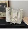 Bolsa Grande Tendência Simples Primavera Verão 2026 Bolsa Tote de Ombro Único Nova Grande Capacidade para Compras Mão Corrente Bolsa Feminina