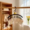 Tendedero de ropa con personaje Motti de dibujos animados con múltiples pinzas para uso doméstico en balcón, tendedero a prueba de viento para calcetines, ropa interior y prendas pequeñas
