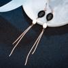 Nuevos pendientes largos ovalados de acero de titanio de la suerte para mujer, pendientes de borla con temperamento, pendientes de oro rosa, venta al por mayor de joyería