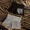 Shorts de moda Y2K con cintura ancha plegable y estampado de alas de ángel, ajustados y ceñidos a la cadera, tipo hot pants deportivos casuales para chica hot