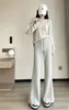 Calça de Tecido Arroz Pegajoso Micro Flare Feminina Outono Inverno Nova Cintura Alta Emagrecedora Calça de Arroz Pegajoso Wide Leg Toque de Luxo Calça Reta com Cordão Flare