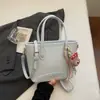 Bolso Cubo Elegante y de Moda de Shuai Mi para Mujer, Nuevo Modelo 2026, Bolso de Hombro Sencillo para el Trabajo, Bolso Cruzado de Hombro de Alto Valor