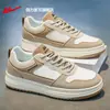 Zapatos de lona para hombre Warrior, nuevos zapatos deportivos de cuero de otoño 2026, zapatillas casuales versátiles para hombre