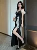 Vestido de noche negro con estampado de camelia para mujer, lujo ligero, mangas con volantes, abertura, vestido largo para anfitriona de banquete