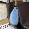 Llavero de coche de piel de zorro, colgante para bolso de piel auténtica, adorno colgante de peluche, decoración de cola linda, accesorio de llavero personalizado y elegante