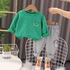 Traje para niño nuevo cara sonriente manga larga ropa infantil primavera y otoño conjunto de dos piezas de suéter y pantalones para bebé Venta al por mayor