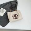 2025 Gran Capacidad Gamuza de Ciervo Terciopelo Nuevo para Mujer Otoño e Invierno Casual Color Sólido Retro Casual Moda para el Trabajo Bolso de Hombro Tote