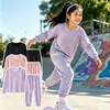 Nuevo conjunto exterior colorido para niños 2026, colección de otoño, sudadera de color liso unisex y pantalones largos, conjunto deportivo de dos piezas