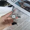 Novo Relógio Feminino Minimalista Artístico de Pequeno Mostrador Extensível para Atacado com Pulseira Tecida de Contas para Estudantes
