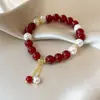 Pulsera de Ágata Roja y Perla Shi Jia para Mujer, Diseño de Nicho de Lujo Ligero, Hilo de Mano de Estilo Suave, Joyería para Mejor Amiga, Elástica Ajustable