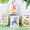 Bolsa de papel kraft de tamaño mediano con dibujos animados para niños, exquisita bolsa de regalo, linda bolsa de regalo de Navidad, venta al por mayor