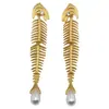 Pendientes Minimalistas de Perla con Forma de Espina de Pescado Diseño de Personalidad Nicho Pendientes de Botón Moda Retro Versátil Pendientes Exagerados