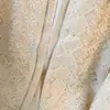 Abrigo fino de encaje extremadamente hermoso para mujer, nuevo modelo de principios de otoño de 2026, deslumbrantemente hermoso y único con bordados elaborados