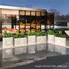 Departamento de ventas inmobiliarias estanque de flores de hierro forjado parterre decoración exterior combinación de canaleta para flores hotel restaurante maceta exterior caja para plantar árboles