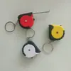 Chaveiro de pneu retrátil automático mini trena 1m trena régua de presente pequena portátil régua de medição de roupas fita de aço