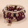 Traje de joyería bohemia de venta caliente transfronteriza europea y americana, traje de pulsera para mujer con borlas de cristal multicapa y cuentas