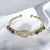 Pulseira Aberta Flor Quadrada de Diamante Colorido com Zircônia de Camada Dupla Moda Transfronteiriça Europeia e Americana Nova Pulseira Joia de Mão Exquisita de Celebridade da Internet