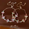 Pulseira de flor de trevo de zircônia, luxo leve nicho sensação de alta qualidade, joias de moda requintadas e versáteis atacado