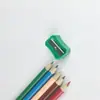 Afilador de lápices simple venta al por mayor en stock plástico octagonal un agujero color se puede especificar manual papelería para estudiantes