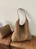 Diseño casual, elegante, gran capacidad, bolso de un solo hombro, tendencia de moda 2026, nicho, práctico para ir al trabajo, simple, bolso tote retro, bolso de axila