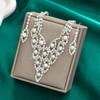 Suministro transfronterizo, comercio exterior, gran venta, cadena de garra, imitación de perla, collar de diamantes de imitación, pendientes, traje, vestido, joyería, collar de banquete