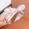 Diadema con estampado de lazo fresca y dulce transfronteriza, diadema de ala ancha con conejito y oso lindos con orejas de conejo anudadas para niños