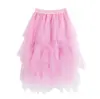 Saia midi de tule irregular para primavera e verão, estilo fada, cintura alta e modelagem que afina a silhueta. Saia versátil estilo bolo.