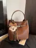 Bolso Versátil con Patrón de Lichi para Mujer 2026 Nuevo Estilo Bolso Cubo Suave de Gama Alta Bolso Cruzado Retro para Primavera y Verano para Mujer