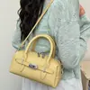 Bolsa de mão feminina casual de nicho vintage, bolsa almofada, nova moda primavera 2026, estilo coreano, bolsa transversal simples para o dia a dia