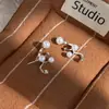Pendientes de Perla Estrellada Estilo Coreano y Japonés de Aguja de Plata para Mujer, Pendientes de Diseño de Nicho de Lujo Ligero, Nuevos Pendientes Populares 2026