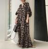 Vestido camisero bohemio casual holgado de moda elegante japonés y coreano con estampado de leopardo, cuello alto y manga abullonada