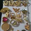 Bolsa Feminina Moda Fecho Personalizado Dourado Claro Cabeça de Coelho Veado Folha Fivela Design Torcido Ab1892