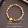 Pulsera Pu Zuo Color Fuerte que Conserva el Color, Chapada en Oro, Incrustada con Diamantes, con Cuentas de Corazón de Melocotón Suerte Cepilladas y Cuentas de Cristal Imitación Color Champaña Facetado