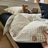 Conjunto de cuatro piezas de jacquard lavado estilo minimalista con botones, sábana bajera y funda nórdica de algodón lavado, juego de tres piezas de sábana bajera ajustada para dormitorio de estudiante 4