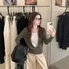 Camisa polo de diseño niche de terciopelo Andy para otoño e invierno al por mayor transfronterizo, top de punto de manga larga de imitación de dos piezas para mujer con cuello de solapa