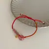Flor de Pessegueiro ~ Cristal de Morango Fivela Segura Pulseira Trançada Marca Fu Feminina Design de Nicho de Luxo Leve Corda de Mão para Casal Celebridade da Internet