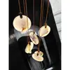 Lustre todo em cobre com mármore espanhol, iluminação de luxo transfronteiriça para escada de villa duplex, luminária giratória para átrio de sala de estar