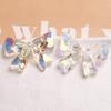 Láser Aurora color mágico resina lazo aretes diadema parche de resina joyería accesorios femeninos material mayoreo