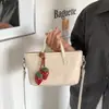 Bolsa de balde versátil e estilosa para uso transfronteiriço, bolsa de ombro e transversal moderna para o dia a dia e para o trabalho, bolsa de mão de nicho minimalista e moderna