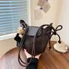 Bolso de cubo nuevo y moderno para mujer 2026, diseño de nicho con estética retro y minimalista, bolso de hombro versátil para mujer