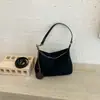 Diseño de nicho con un toque de alta gama, nuevo bolso cruzado de ante esmerilado estilo perezoso retro para el antebrazo, hombro o bandolera para mujer 2026