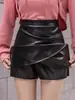 Falda Corta de Cuero Falda para Mujer Otoño e Invierno Moda Europea Explosiones Cintura Alta Falda de Cuero PU de Corte A Falda Irregular para Cadera